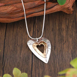 Cadena de corazón vintage de plata y oro