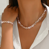 Conjunto de joyas de cristal con diseño en espiga