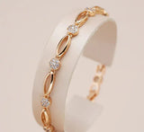 Pulsera de oro elegante con zirconia cúbica